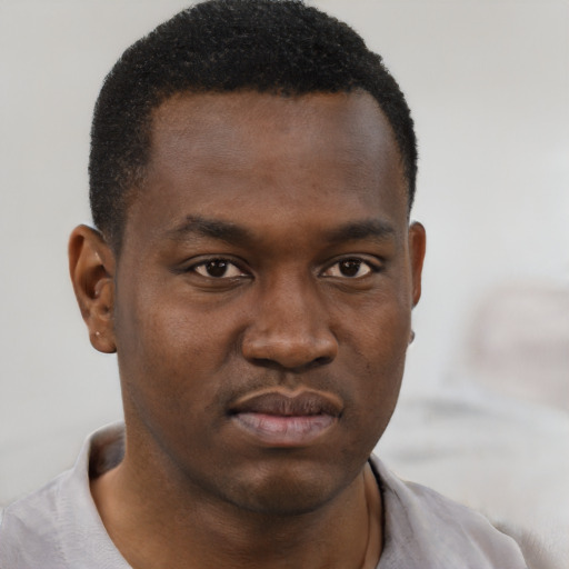 Neutral black young-adult male with short  brown hair and brown eyes