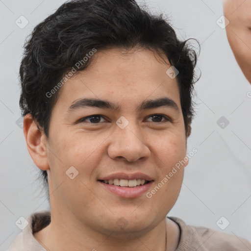 Joyful latino young-adult male with short  brown hair and brown eyes