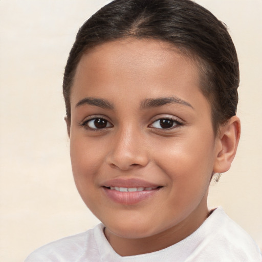 Joyful white child female with short  brown hair and brown eyes