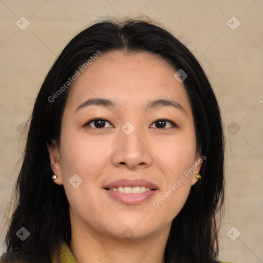 Joyful asian young-adult female with long  brown hair and brown eyes