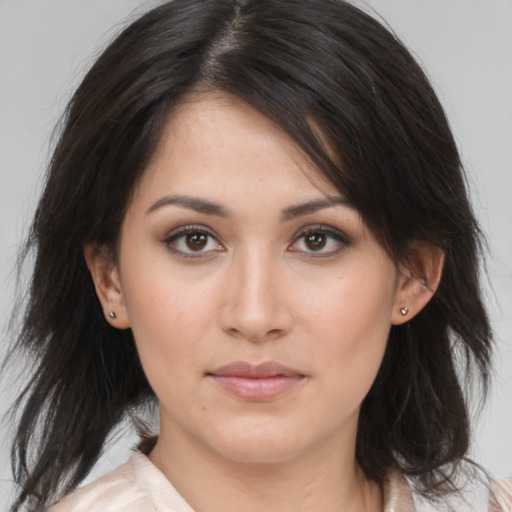 Neutral asian young-adult female with medium  brown hair and brown eyes