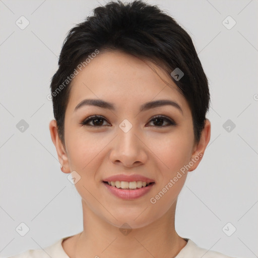 Joyful asian young-adult female with short  brown hair and brown eyes