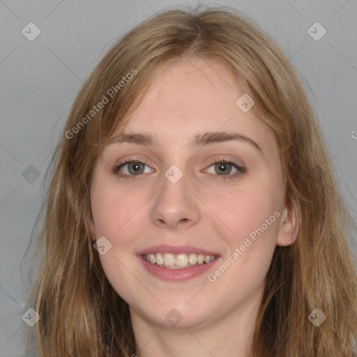 Joyful white young-adult female with long  brown hair and blue eyes