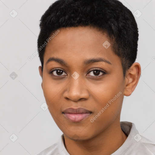 Joyful black young-adult female with short  black hair and brown eyes