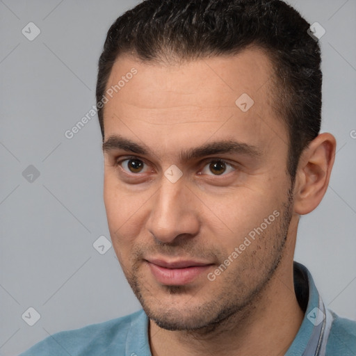 Joyful white young-adult male with short  brown hair and brown eyes