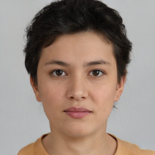 Neutral white young-adult female with short  brown hair and brown eyes