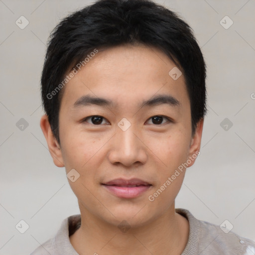 Joyful asian young-adult male with short  black hair and brown eyes