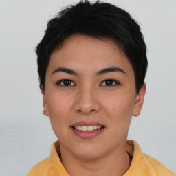 Joyful asian young-adult female with short  brown hair and brown eyes