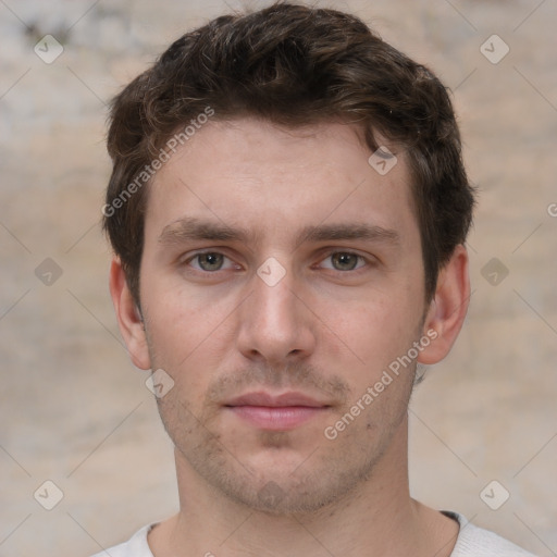 Neutral white young-adult male with short  brown hair and grey eyes