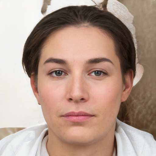 Neutral white young-adult female with short  brown hair and brown eyes