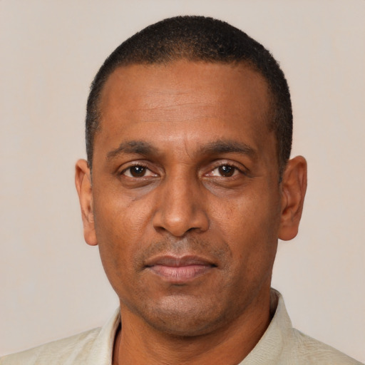 Neutral black adult male with short  black hair and brown eyes