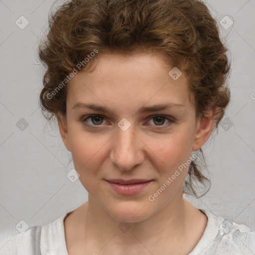 Joyful white young-adult female with medium  brown hair and blue eyes