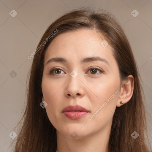 Neutral white young-adult female with long  brown hair and brown eyes