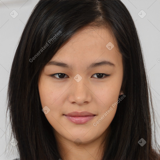 Joyful asian young-adult female with long  brown hair and brown eyes