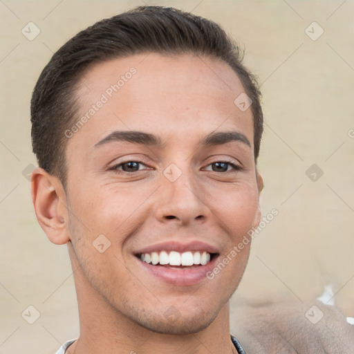 Joyful white young-adult male with short  brown hair and brown eyes