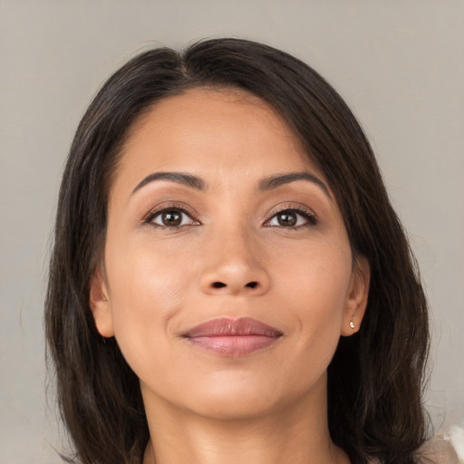 Joyful asian young-adult female with medium  brown hair and brown eyes