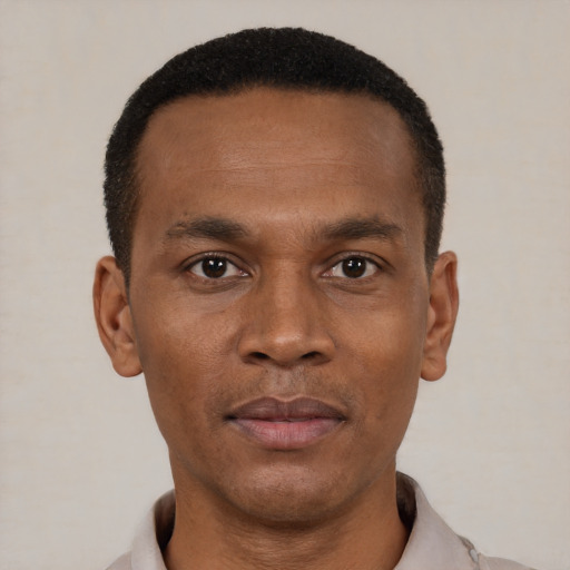 Neutral black young-adult male with short  brown hair and brown eyes