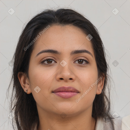 Joyful asian young-adult female with long  brown hair and brown eyes