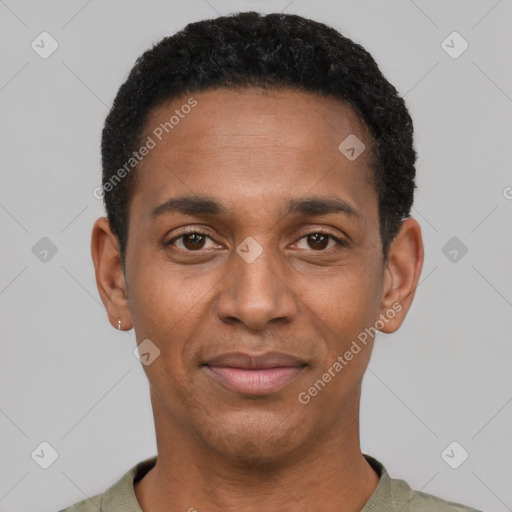 Joyful black young-adult male with short  black hair and brown eyes