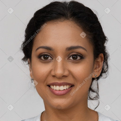 Joyful latino young-adult female with short  brown hair and brown eyes