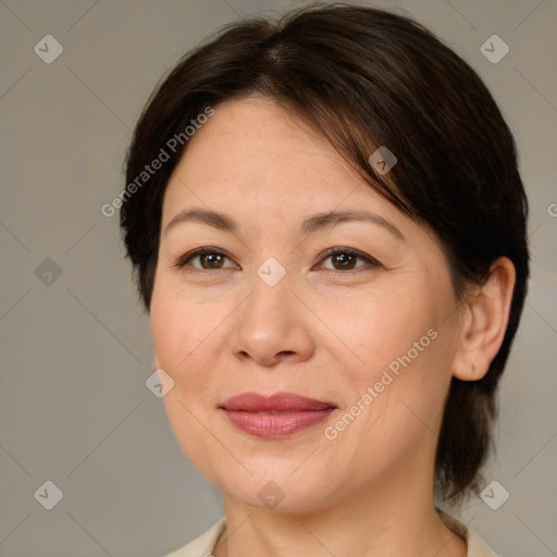 Joyful white adult female with medium  brown hair and brown eyes