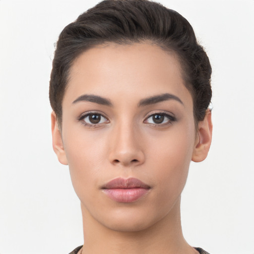 Neutral white young-adult female with short  brown hair and brown eyes