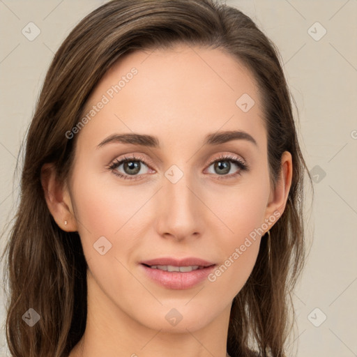 Joyful white young-adult female with long  brown hair and green eyes