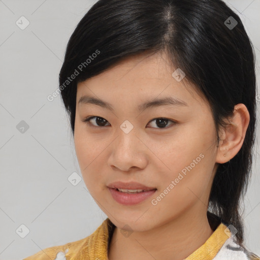 Joyful asian young-adult female with medium  brown hair and brown eyes