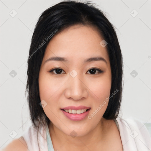 Joyful asian young-adult female with medium  black hair and brown eyes