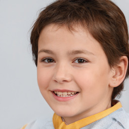 Joyful white child female with short  brown hair and brown eyes