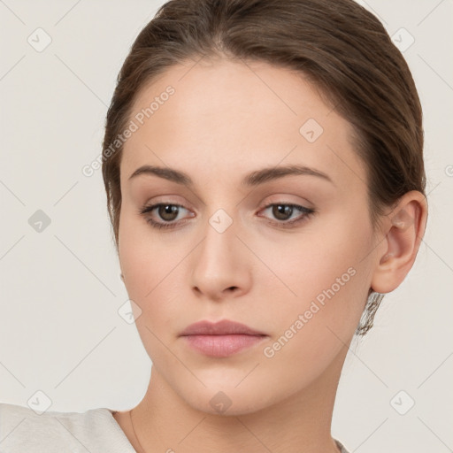 Neutral white young-adult female with short  brown hair and brown eyes