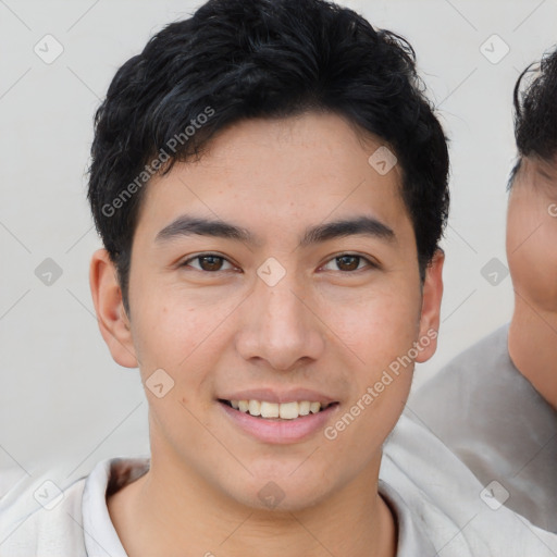 Joyful asian young-adult male with short  brown hair and brown eyes