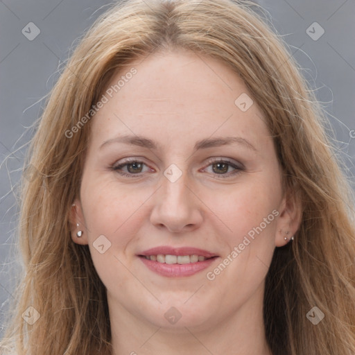 Joyful white young-adult female with long  brown hair and grey eyes