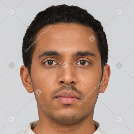 Neutral latino young-adult male with short  black hair and brown eyes