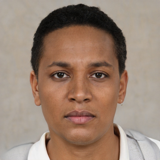 Neutral latino young-adult male with short  brown hair and brown eyes
