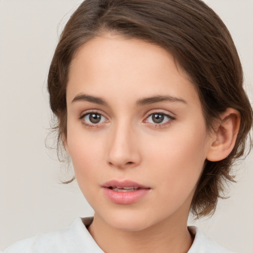 Neutral white young-adult female with medium  brown hair and brown eyes