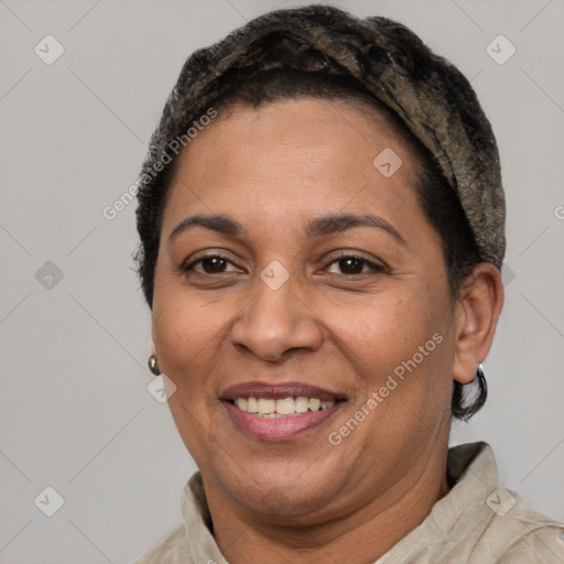 Joyful latino adult female with short  brown hair and brown eyes