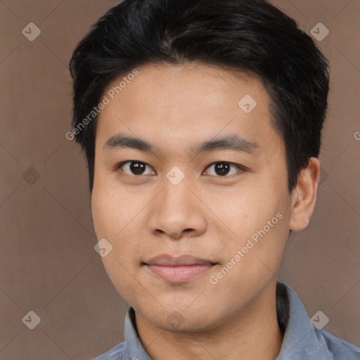 Joyful asian young-adult male with medium  brown hair and brown eyes