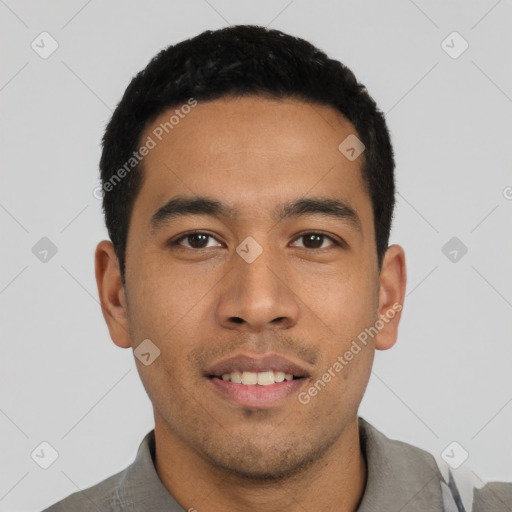 Joyful asian young-adult male with short  black hair and brown eyes