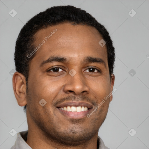 Joyful latino young-adult male with short  brown hair and brown eyes