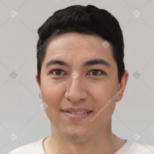 Joyful asian young-adult male with short  black hair and brown eyes