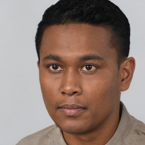 Neutral black young-adult male with short  black hair and brown eyes
