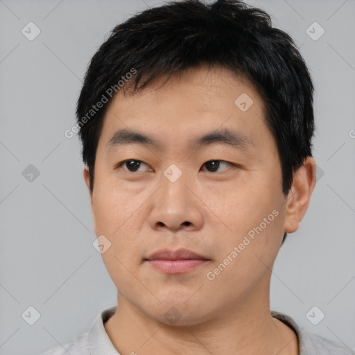 Neutral asian young-adult male with short  black hair and brown eyes