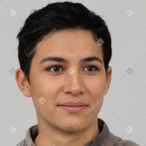 Joyful latino young-adult female with short  brown hair and brown eyes