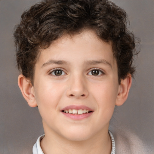 Joyful white child male with short  brown hair and brown eyes