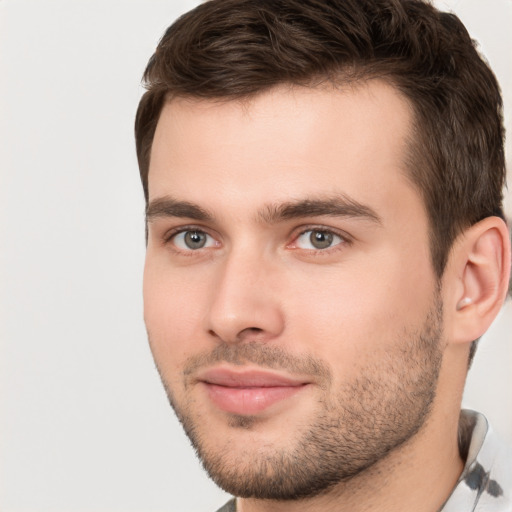 Neutral white young-adult male with short  brown hair and brown eyes