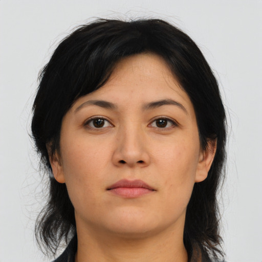 Neutral asian young-adult female with medium  brown hair and brown eyes