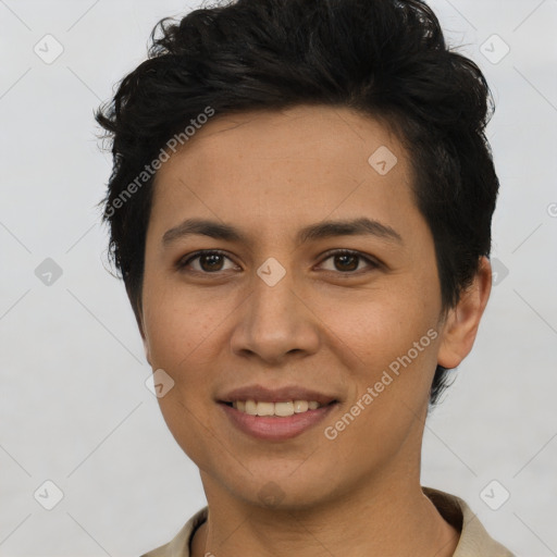 Joyful latino young-adult female with short  brown hair and brown eyes