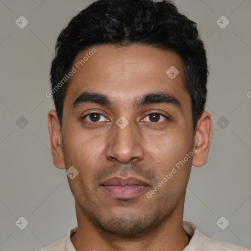 Neutral latino young-adult male with short  black hair and brown eyes
