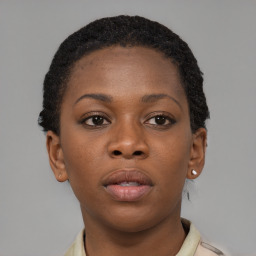 Neutral black young-adult female with short  brown hair and brown eyes